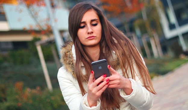 Teenage girl on a smartphone